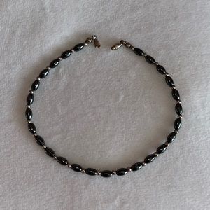Black and gold beaded bracelet